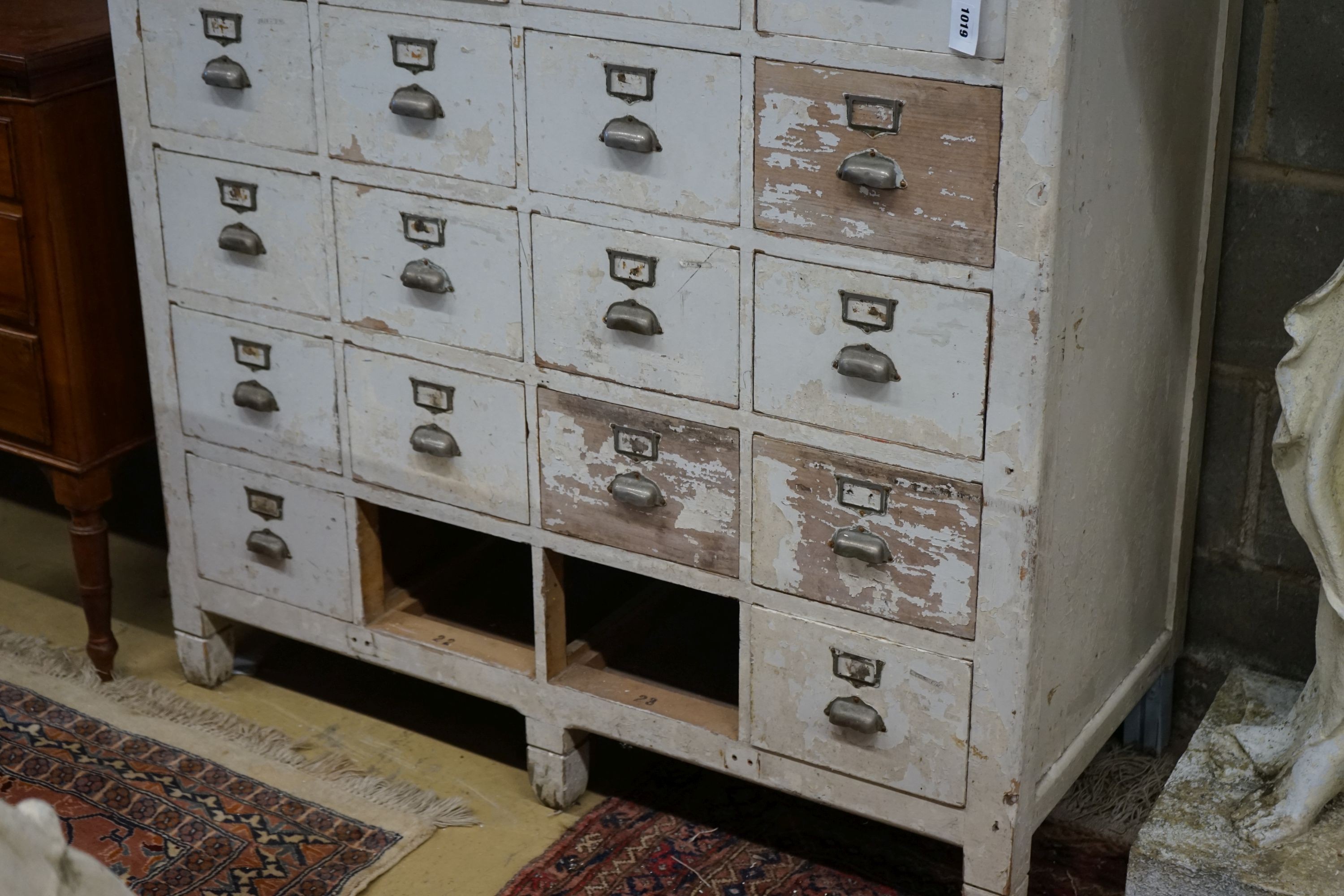An early 20th century painted beech filing cabinet (lacking two drawers), width 114cm, depth 52cm, height 132cm